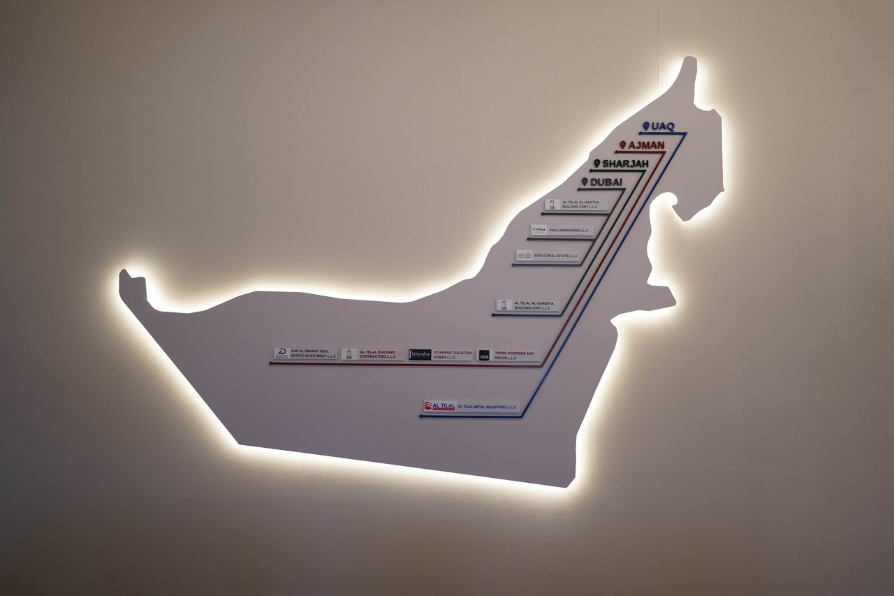 Illuminated UAE map feature wall inside Business Square