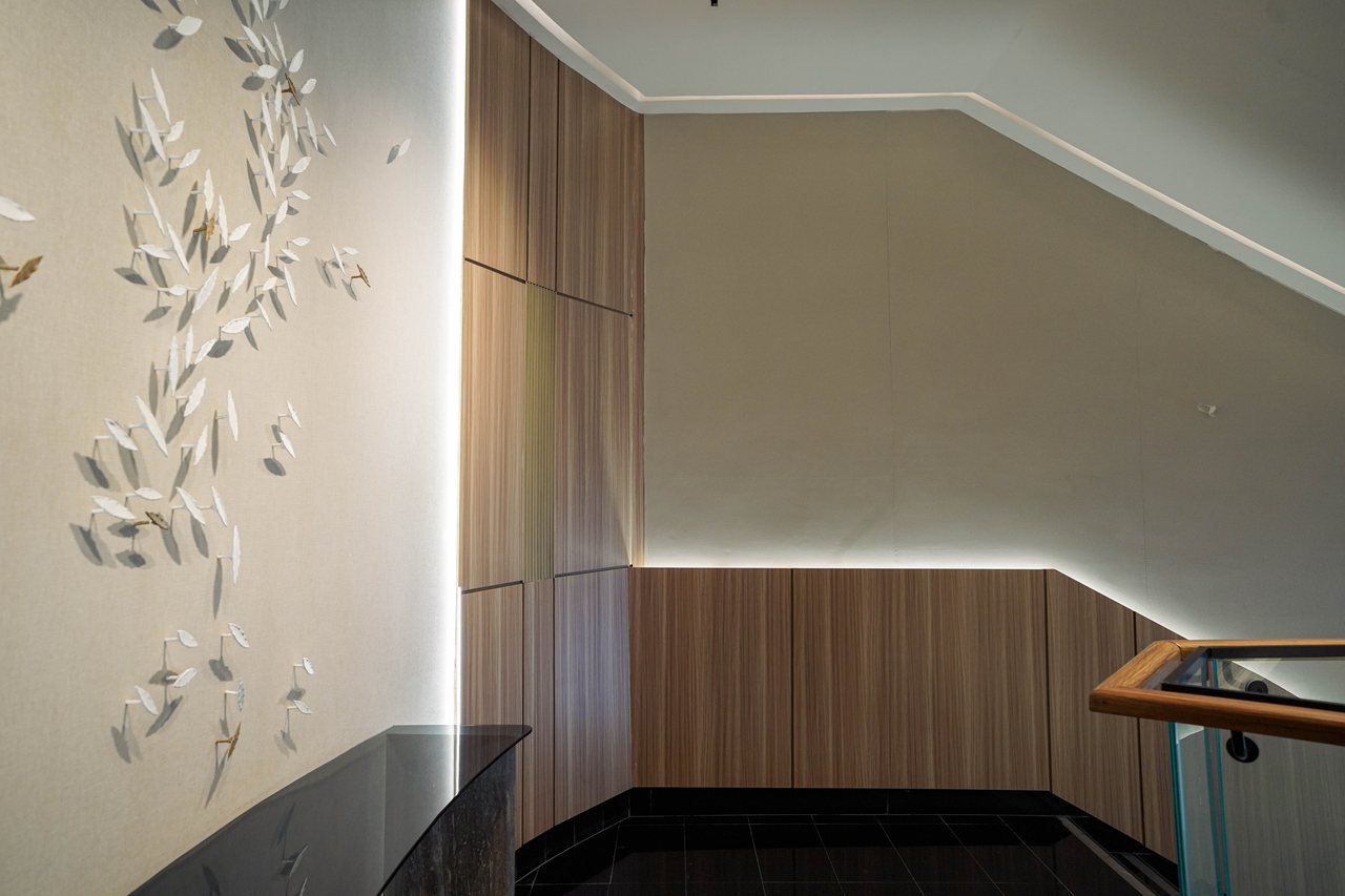 Leaf relief wall beside the feature staircase landing