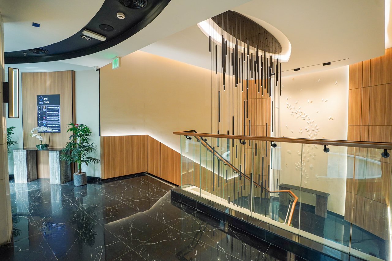 Upper-level walkway overlooking the Business Square atrium