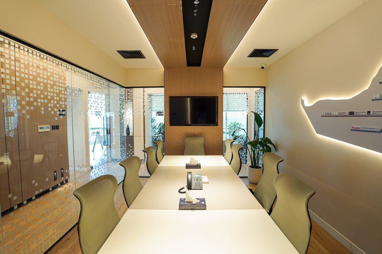 Fitted boardroom in a Business Square office suite with a long meeting table