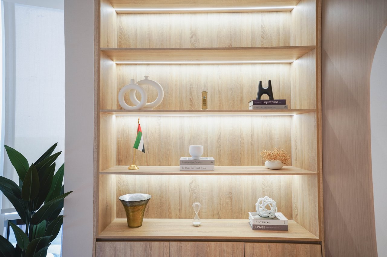 Backlit timber shelving detail in a Business Square office suite