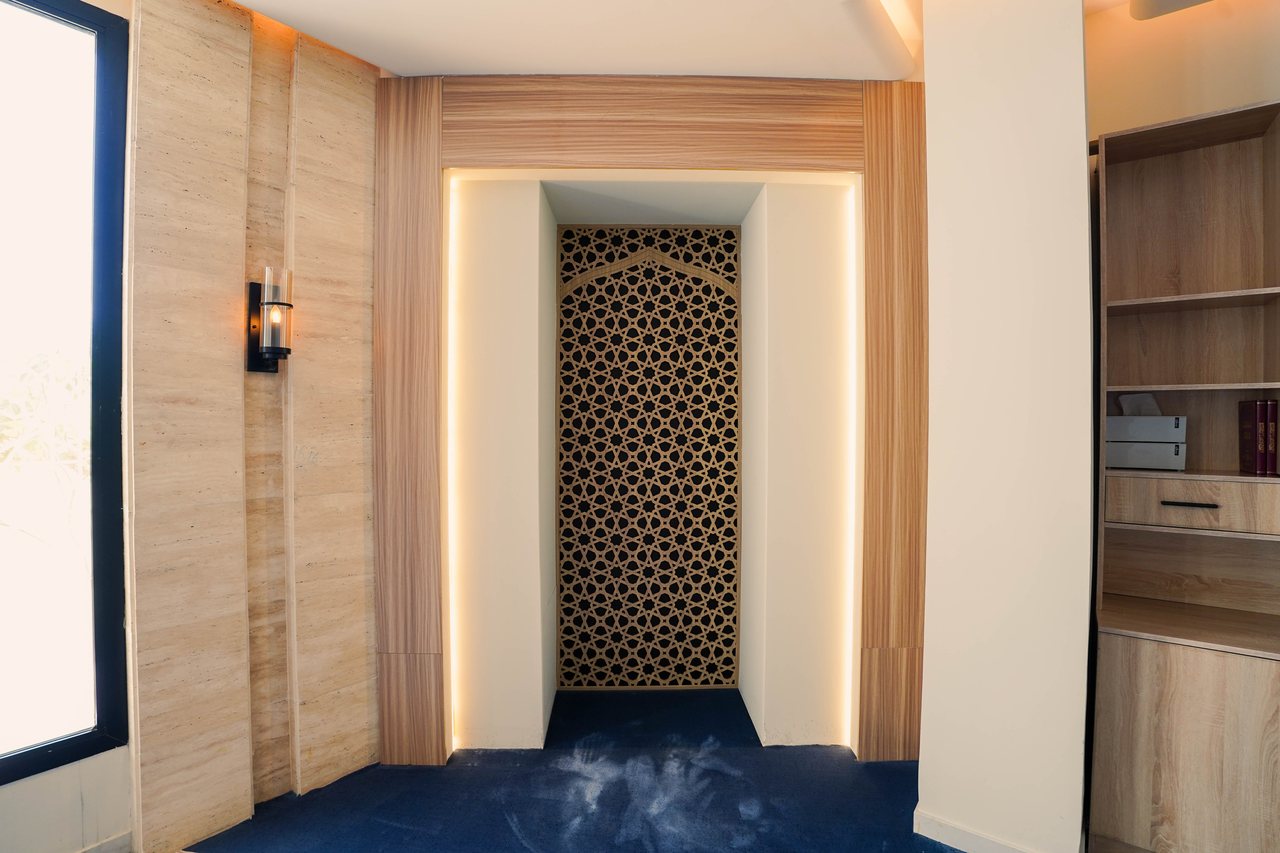 Mihrab niche with perforated screen in the Business Square prayer hall
