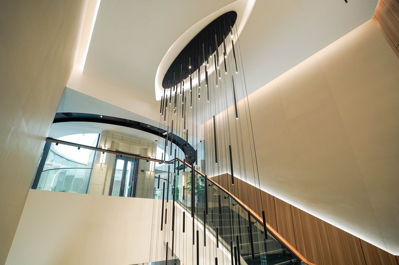 Detail of the chandelier rods suspended in the Business Square stair void