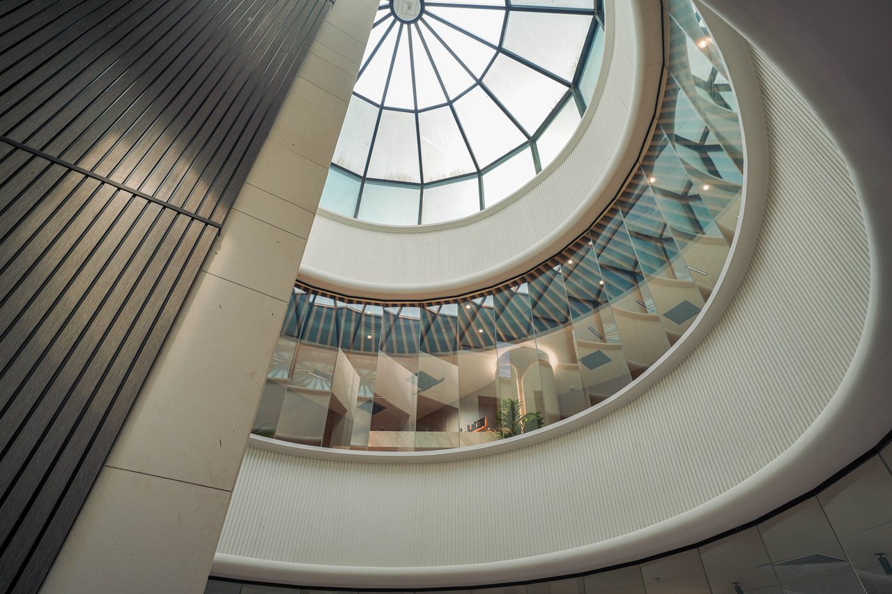 Spiral stair and glazed dome skylight crowning the Business Square core