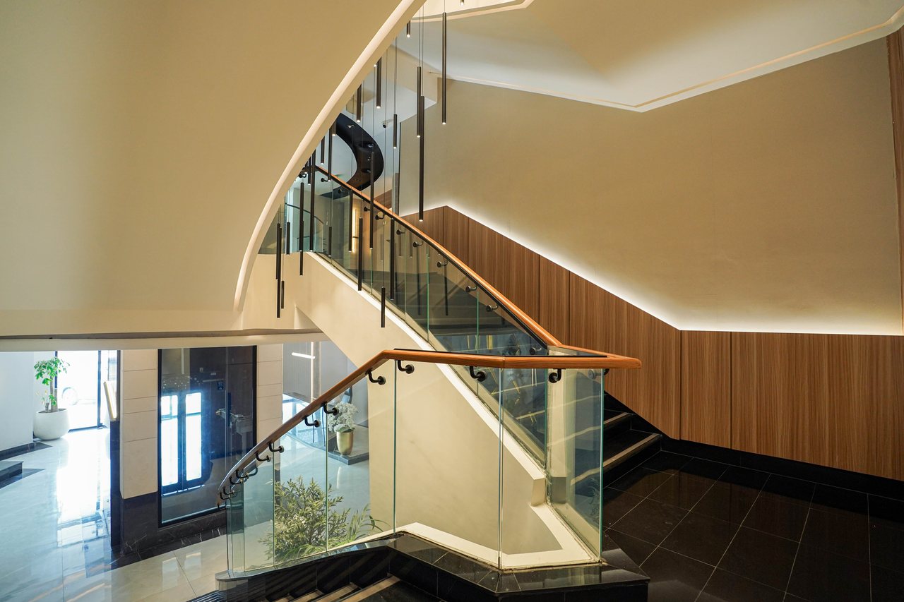 Daylight reaching the staircase landing through the glazed façade