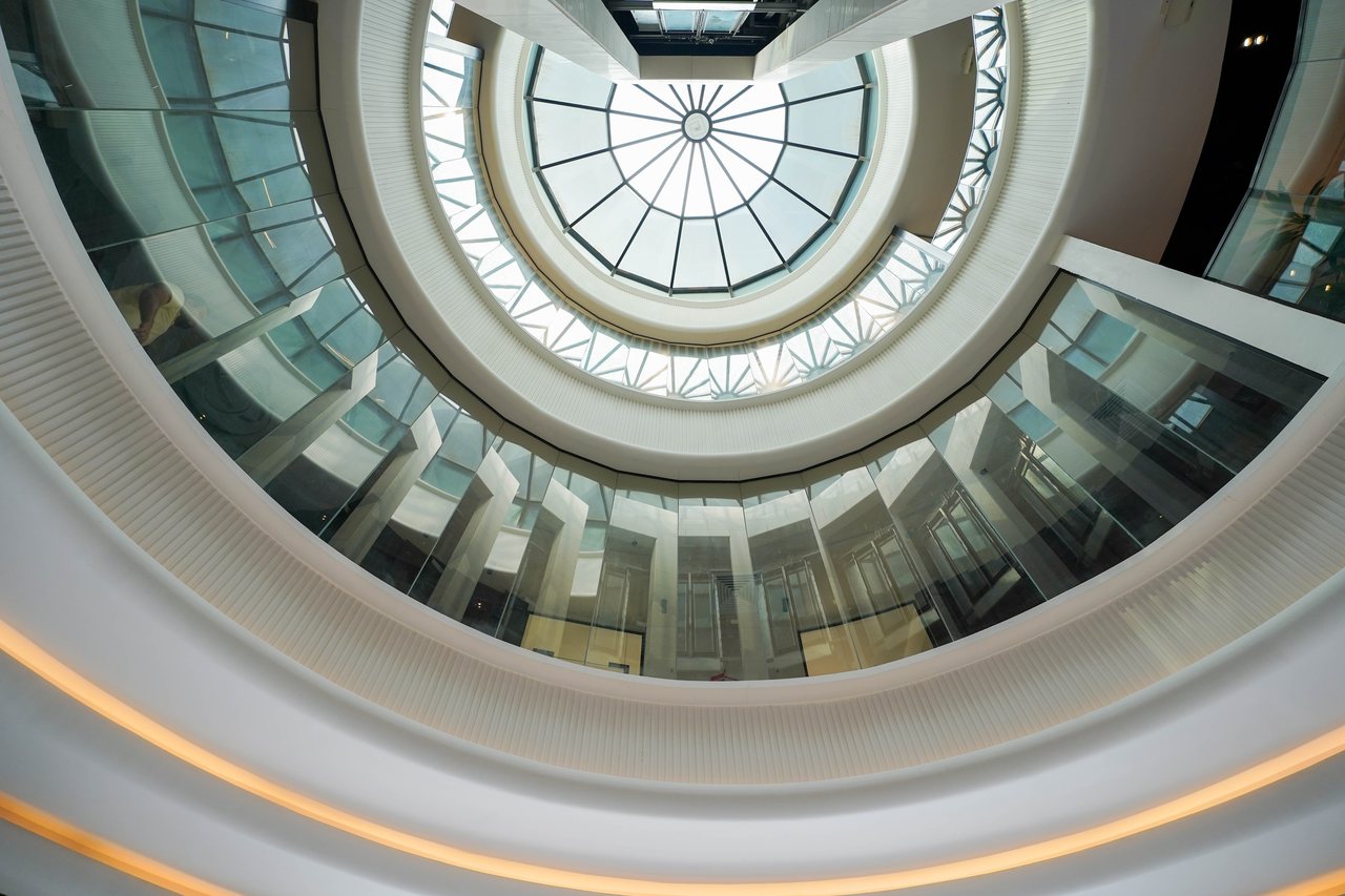 Spiral staircase and glazed dome forming the architectural centrepiece